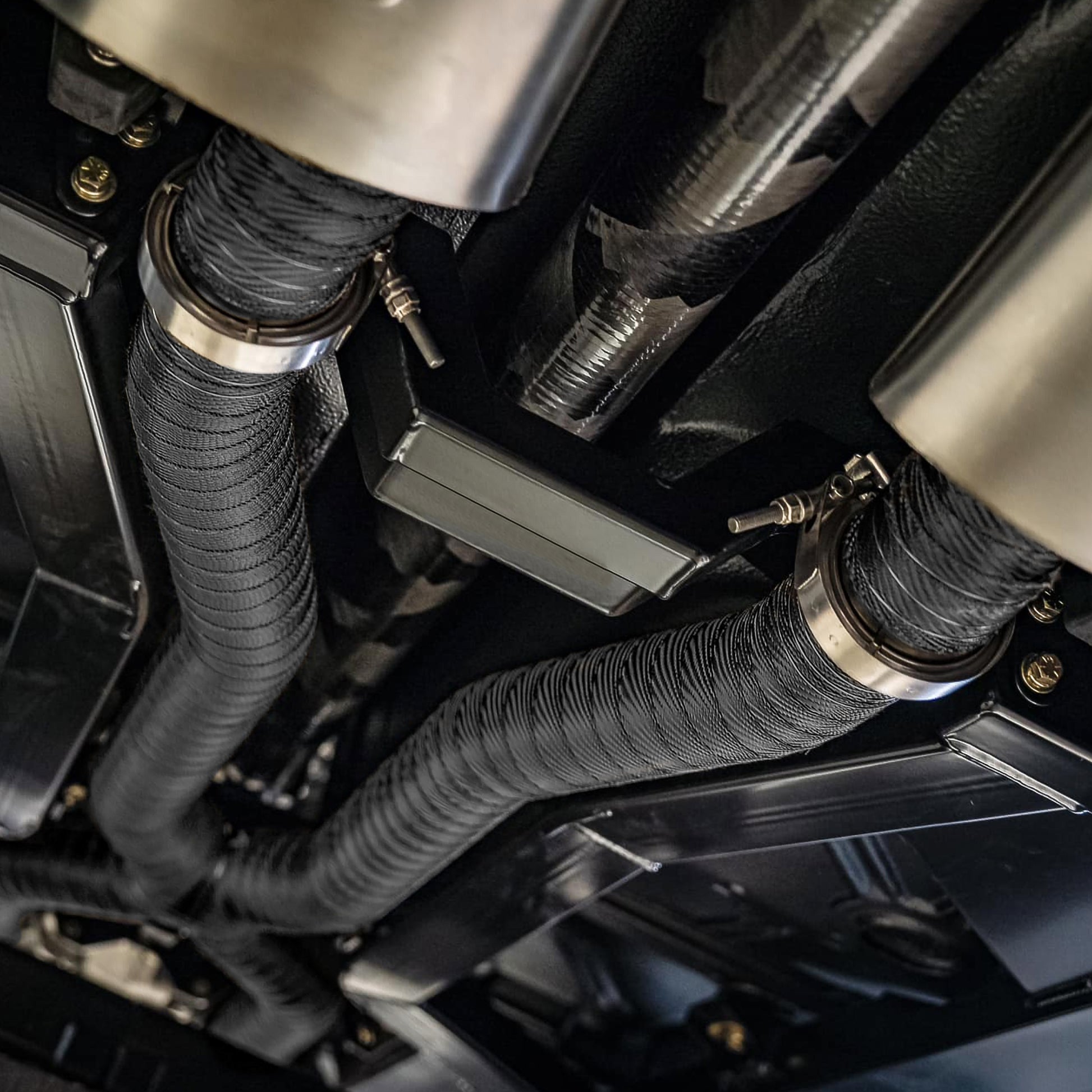 One 25 foot roll of 2 inch wide Black Titanium exhaust wrap. by Design Engineering
