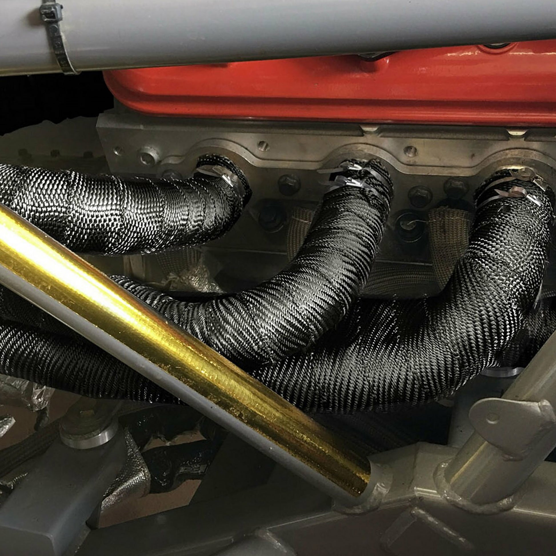 One 15 foot roll of 2 inch wide Black Titanium exhaust wrap. by Design Engineering