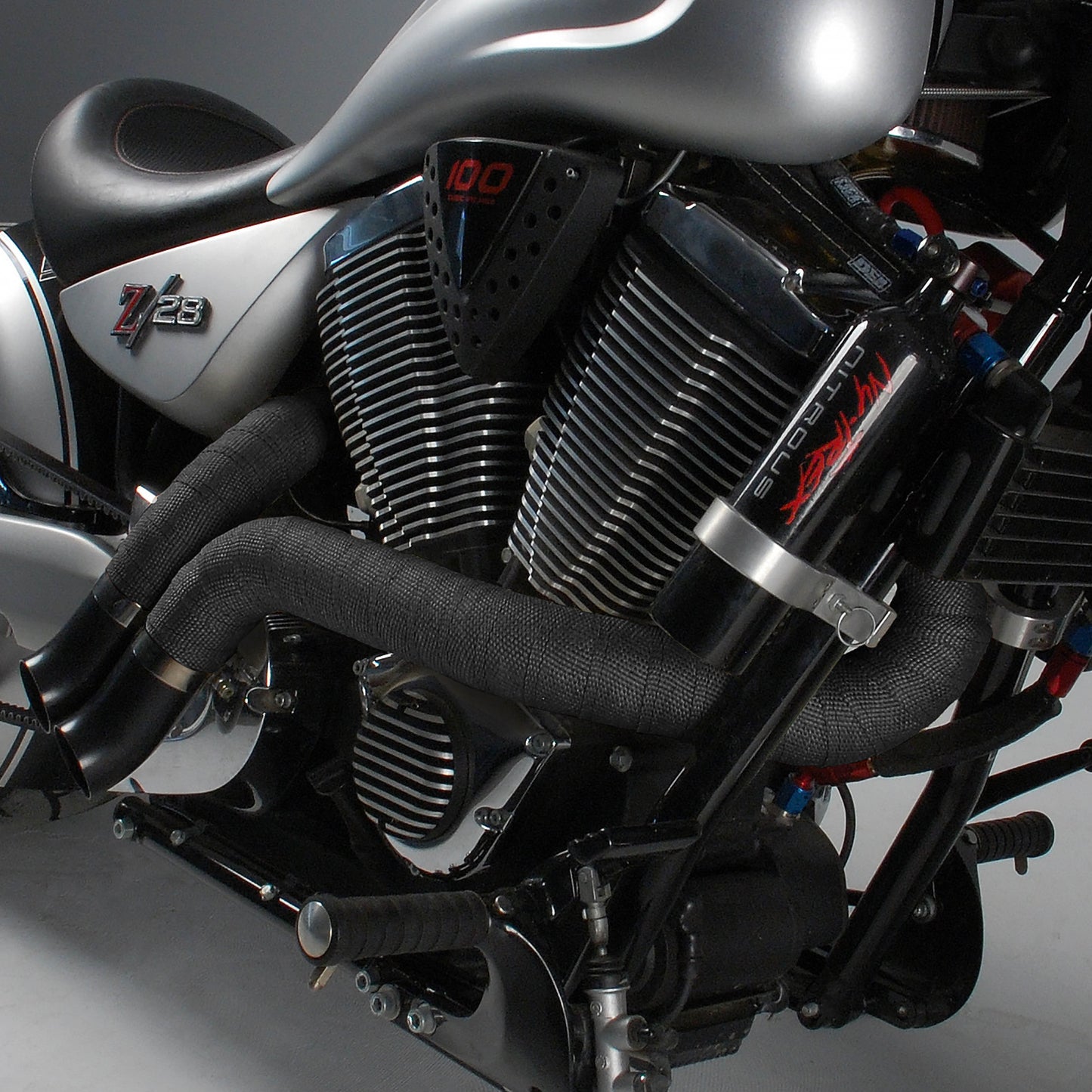 One can of high-temp silicone coating in black. by Design Engineering