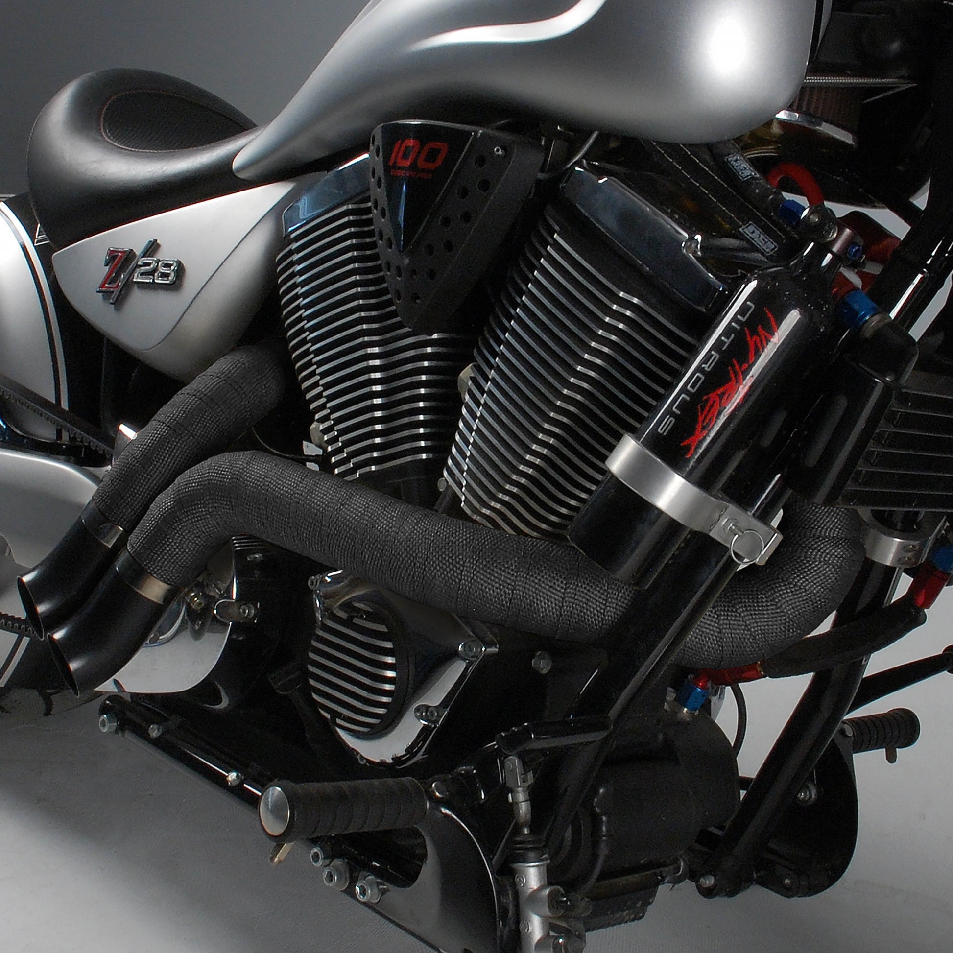 One can of high-temp silicone coating in black. by Design Engineering