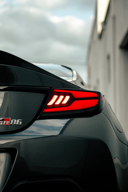 OLM Raiden LED Taillights (Clear Lens/Red Bar) - 2022+ GR86 / BRZ by OLM