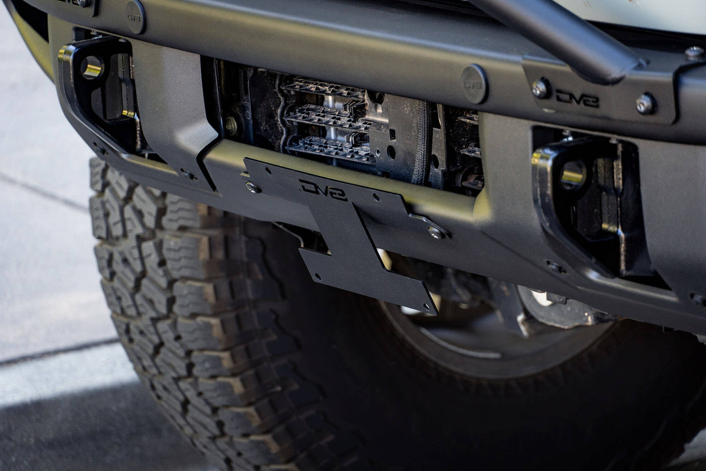 Front License Plate Relocation Bracket by DV8 Offroad