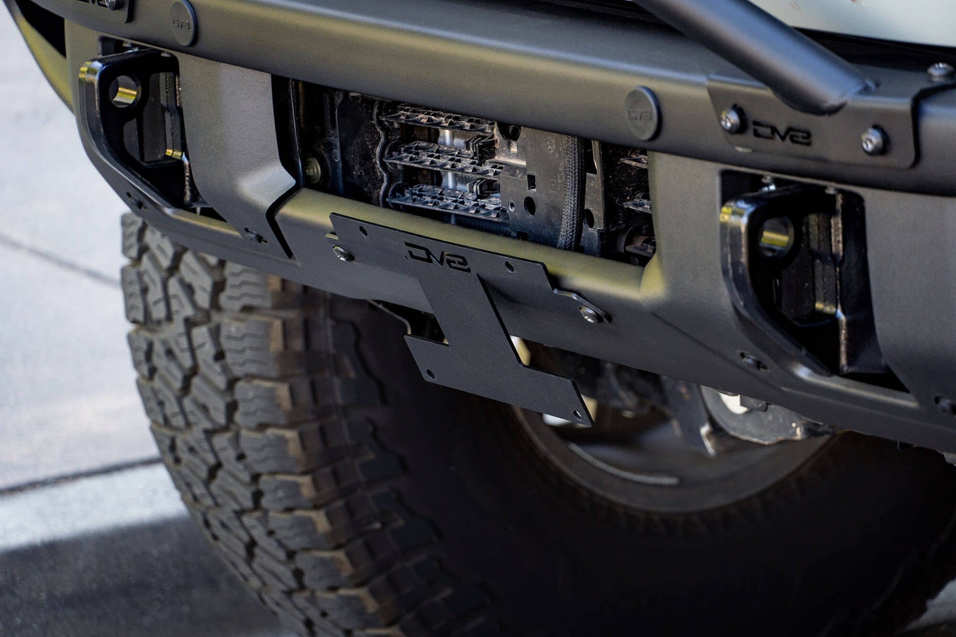 Front License Plate Relocation Bracket by DV8 Offroad