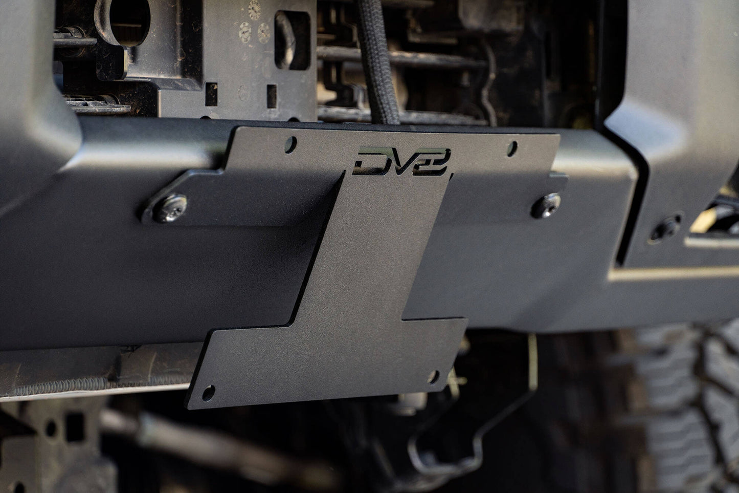 Front License Plate Relocation Bracket by DV8 Offroad
