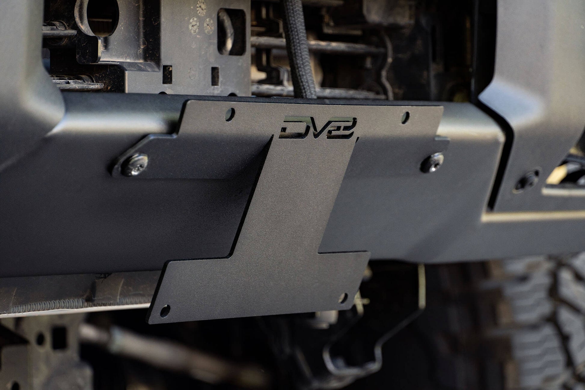 Front License Plate Relocation Bracket by DV8 Offroad