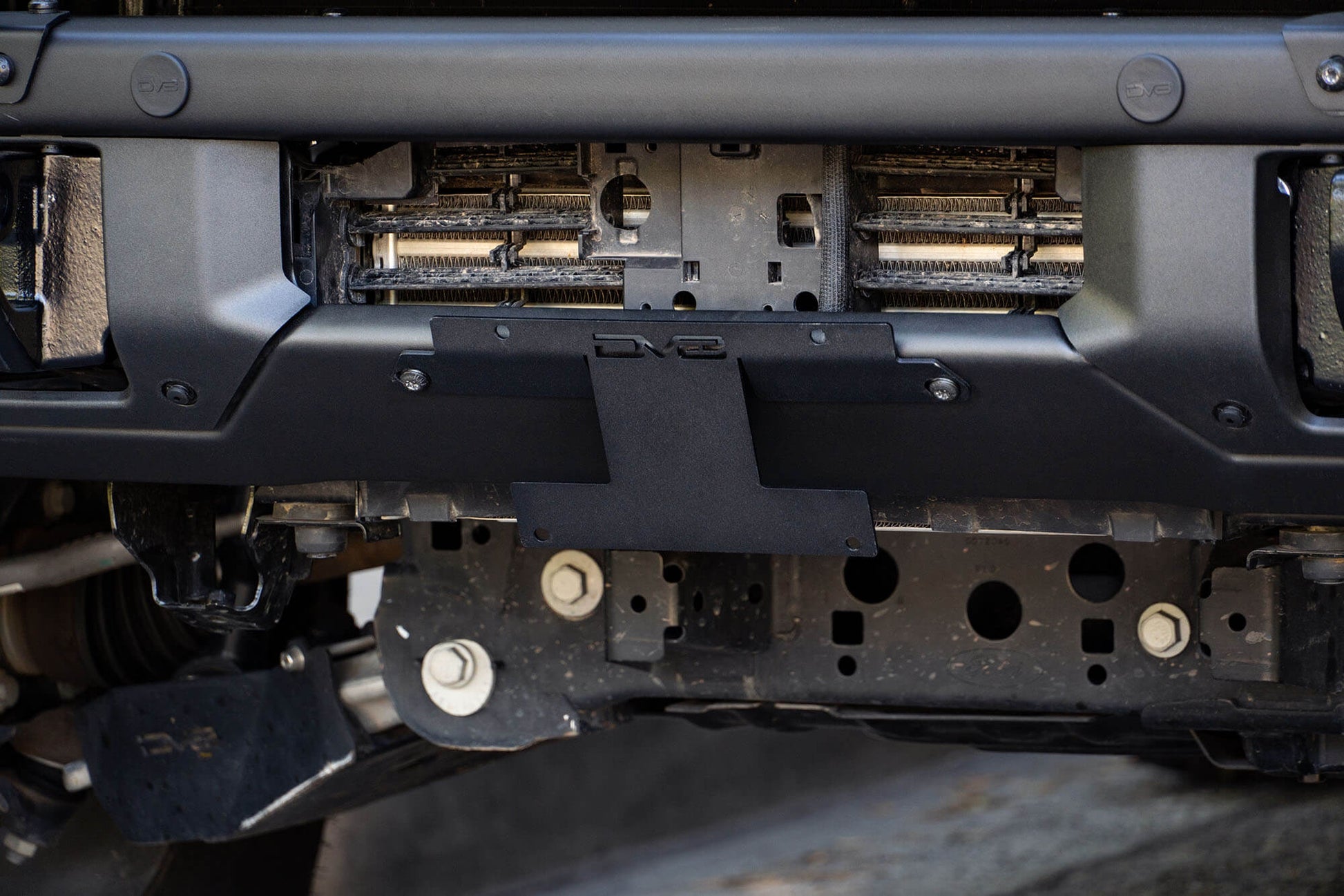 Front License Plate Relocation Bracket by DV8 Offroad