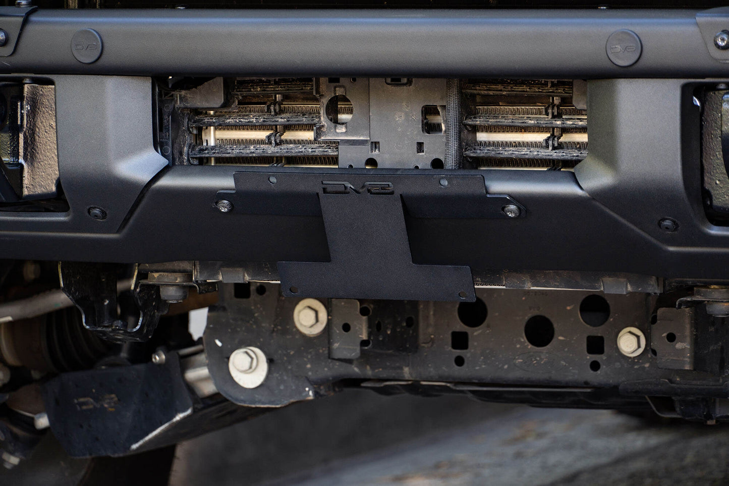 Front License Plate Relocation Bracket by DV8 Offroad