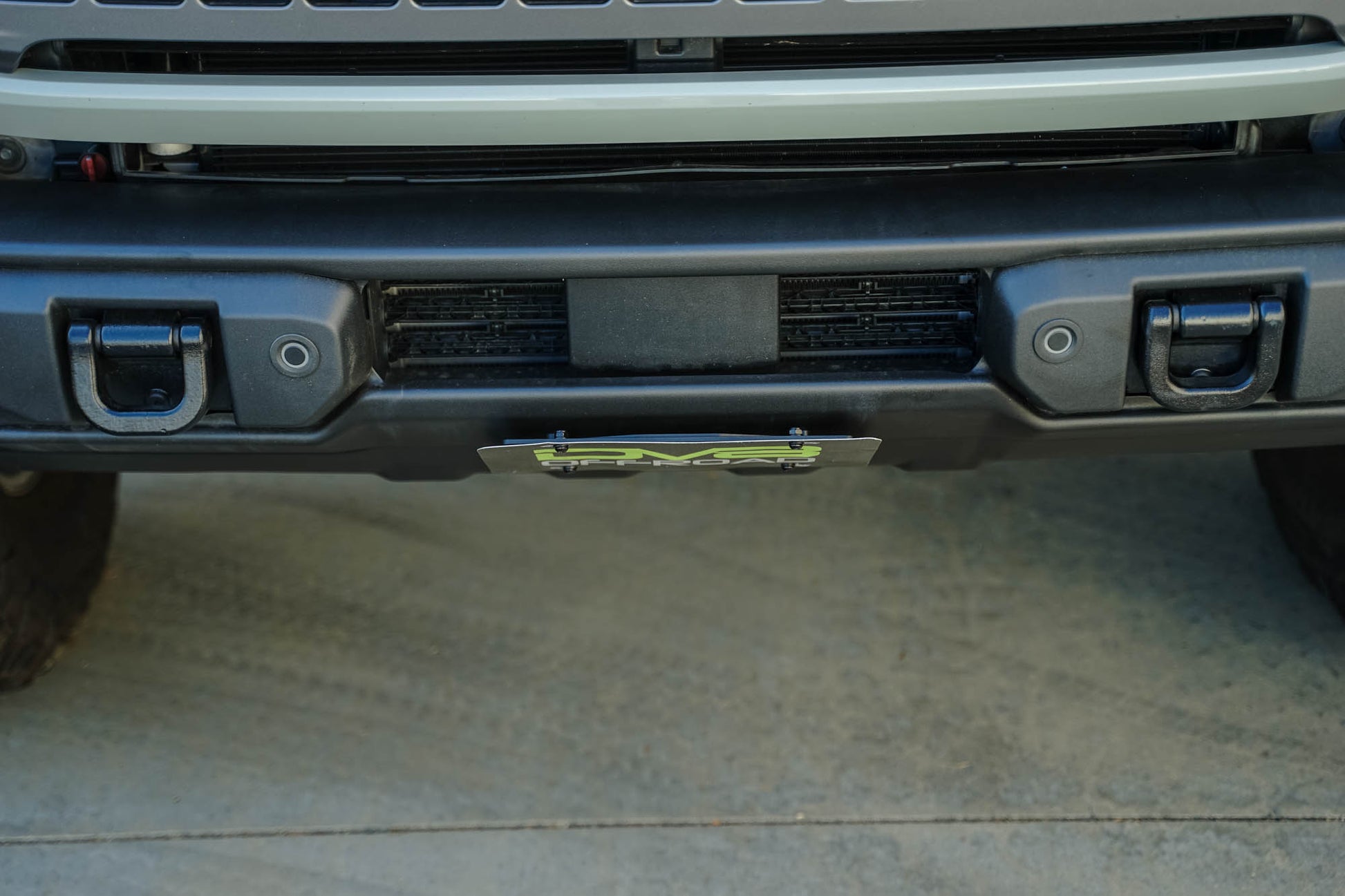 Ford Bronco Capable Bumper Slanted Front License Plate Mount by DV8 Offroad