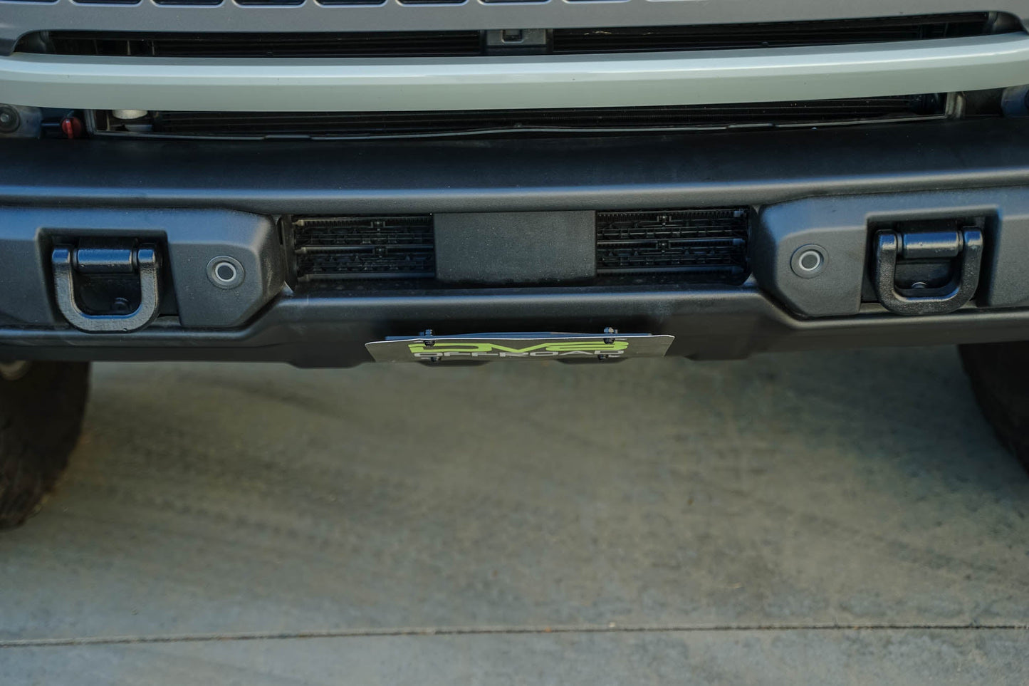 Ford Bronco Capable Bumper Slanted Front License Plate Mount by DV8 Offroad