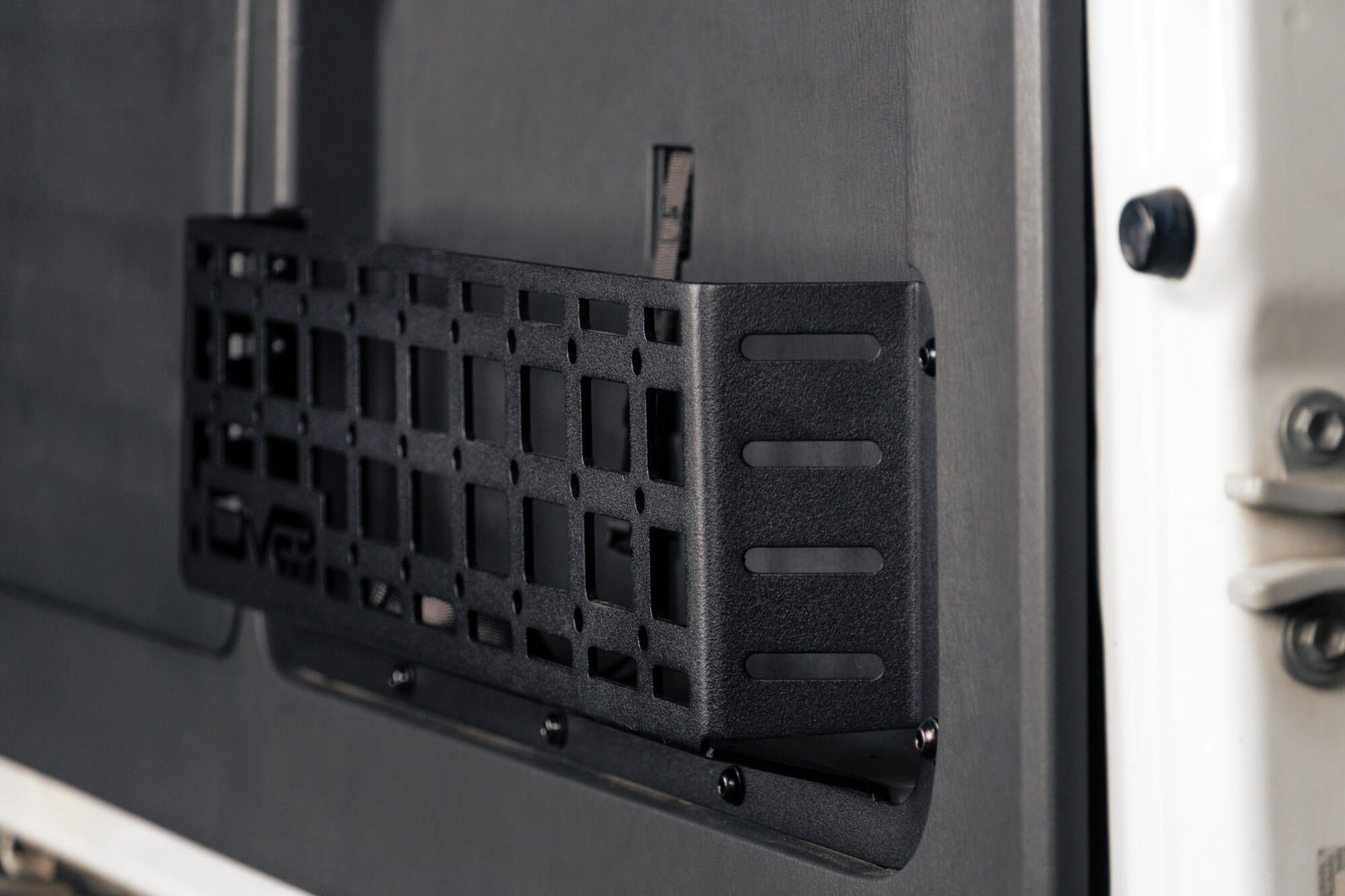 Rugged steel design to replace the flimsy factory net (saggy sack syndrome). by DV8 Offroad