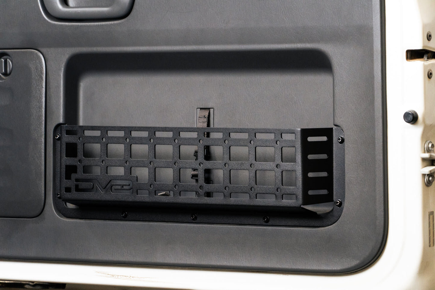 Rugged steel design to replace the flimsy factory net (saggy sack syndrome). by DV8 Offroad