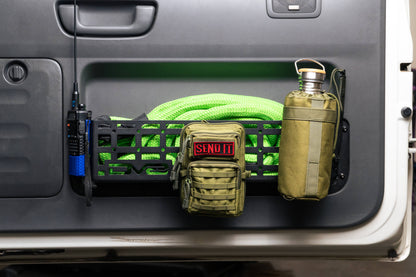 Rugged steel design to replace the flimsy factory net (saggy sack syndrome). by DV8 Offroad