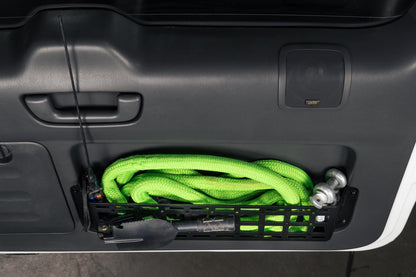 Rugged steel design to replace the flimsy factory net (saggy sack syndrome). by DV8 Offroad