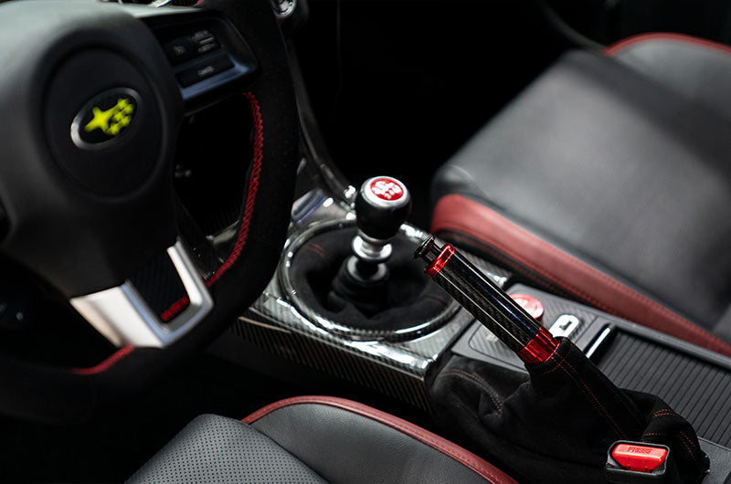 OLM Signature Series Ebrake Handle (Black Carbon w/Red) - 2015-2021 WRX & STI / 2013-2022 FR-S / BRZ / 86 / 2014-2018 Forester / 2013+ *Crosstrek by OLM