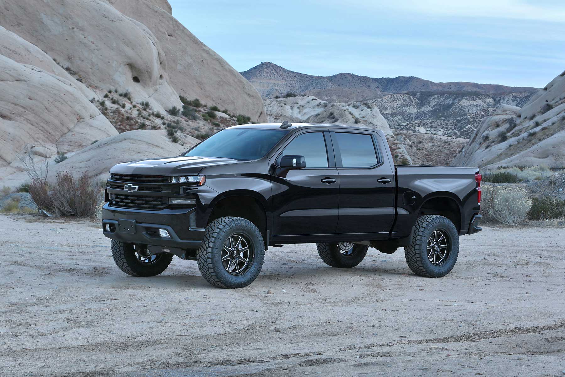 6" PERF SYS W/DL 2.5 & 2.25 2019 GM C1500 P/U. by Fabtech