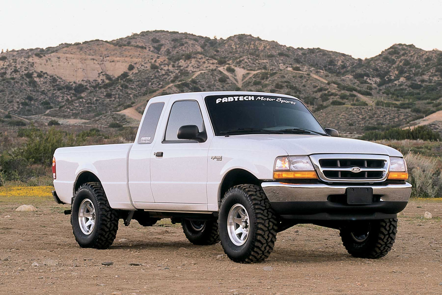 2.5" PERF SYS W/PERF SHKS 98-08 FORD RANGER 2WD COIL SPRING FRONT SUSP W/4CYL&3. by Fabtech