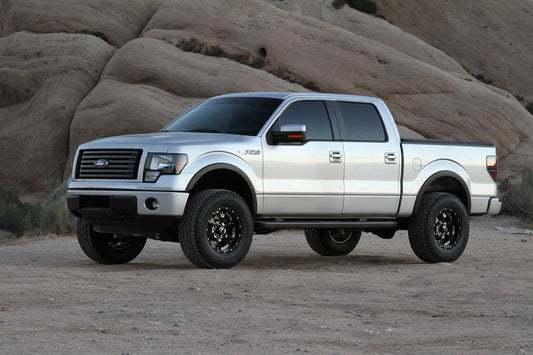4" BASIC SYS W/ PERF SHKS 09-13 FORD F150 4WD. by Fabtech