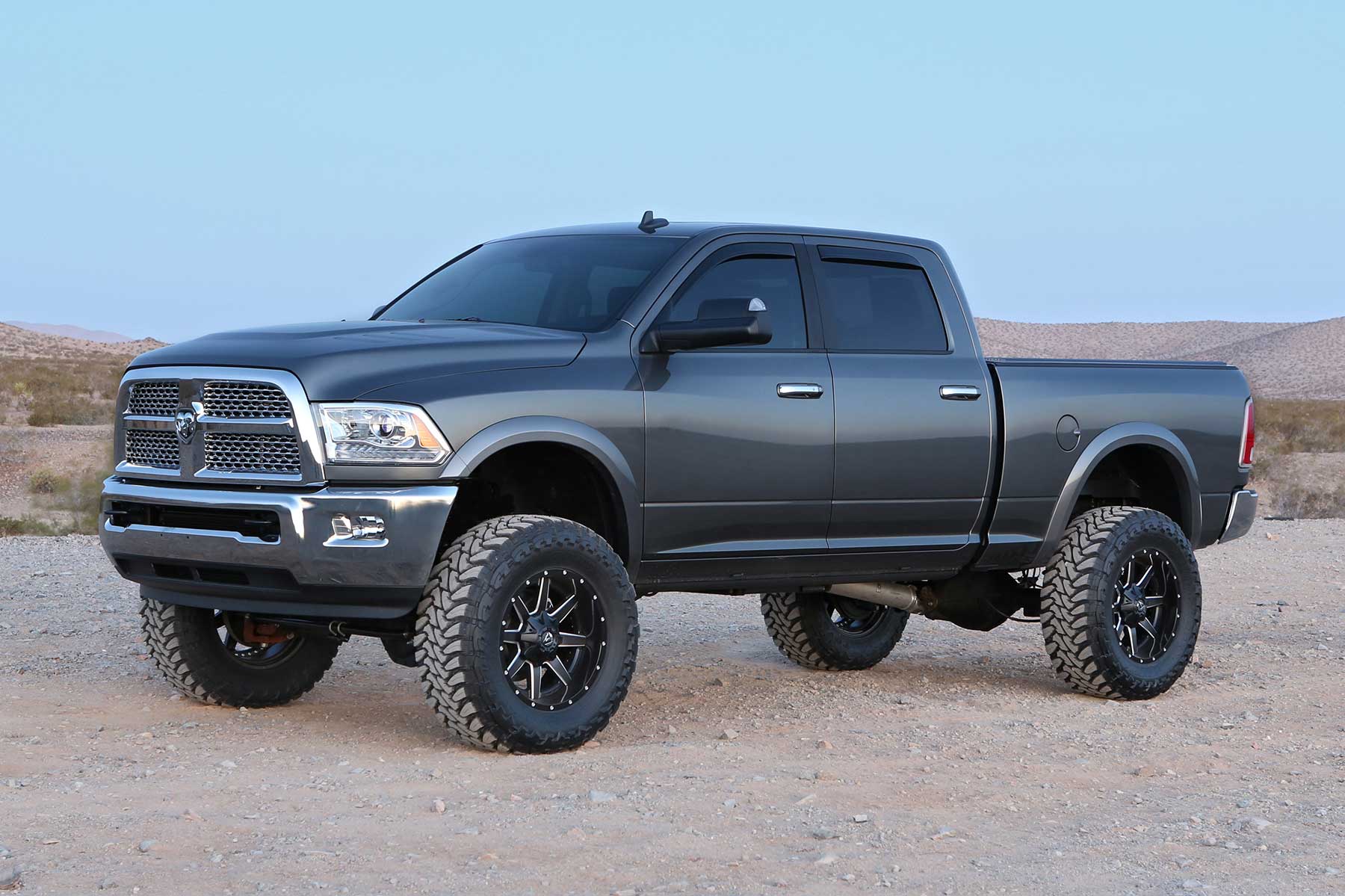 6" PERF SYS W/PERF SHKS 09-13 DODGE 2500/3500 4WD W/DIESEL & AUTO. by Fabtech