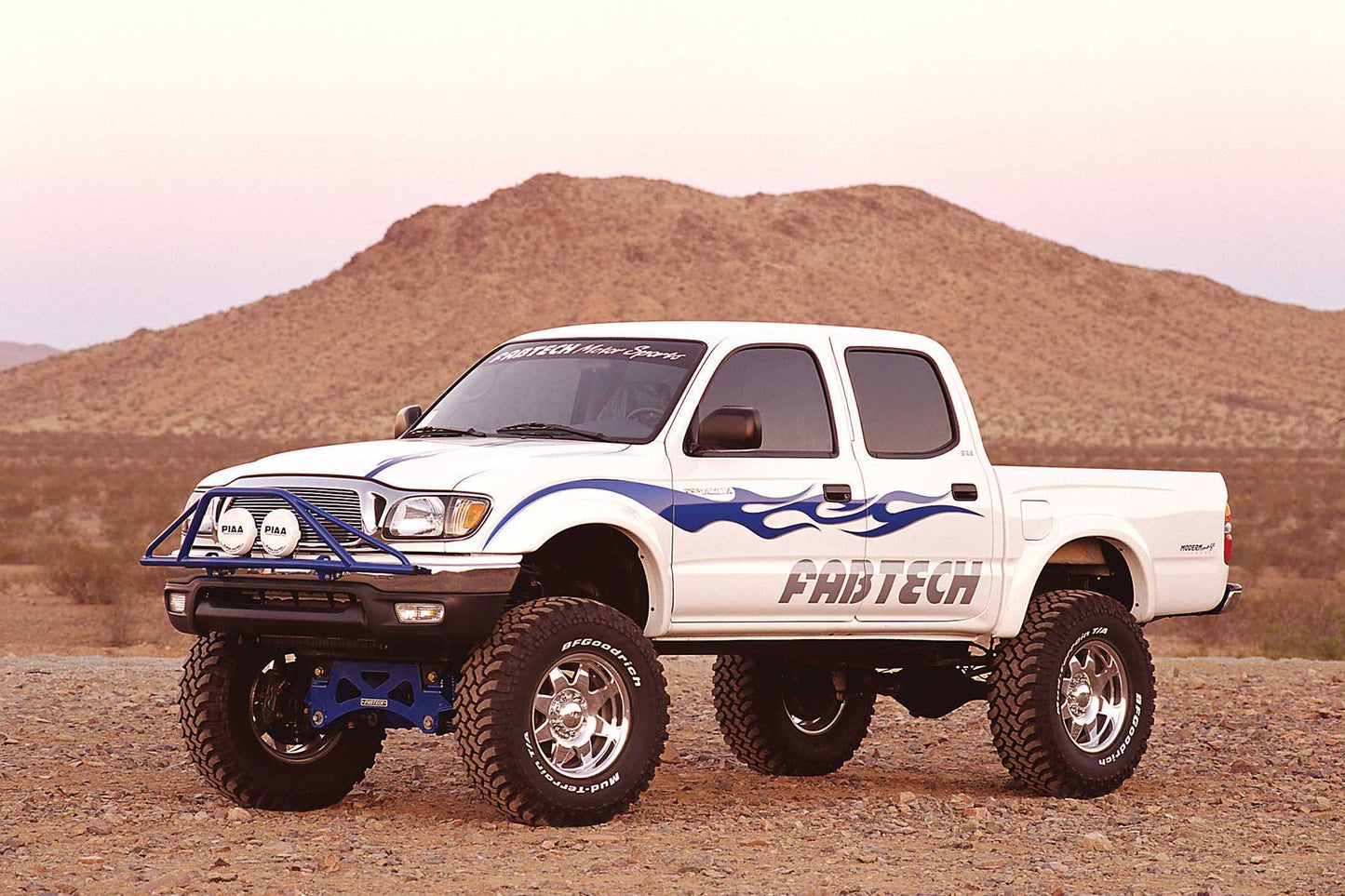 6" PERF SYS W/PERF SHKS 95.5-04 TOYOTA TACOMA 6 CYL 2/4WD 6 LUG. by Fabtech